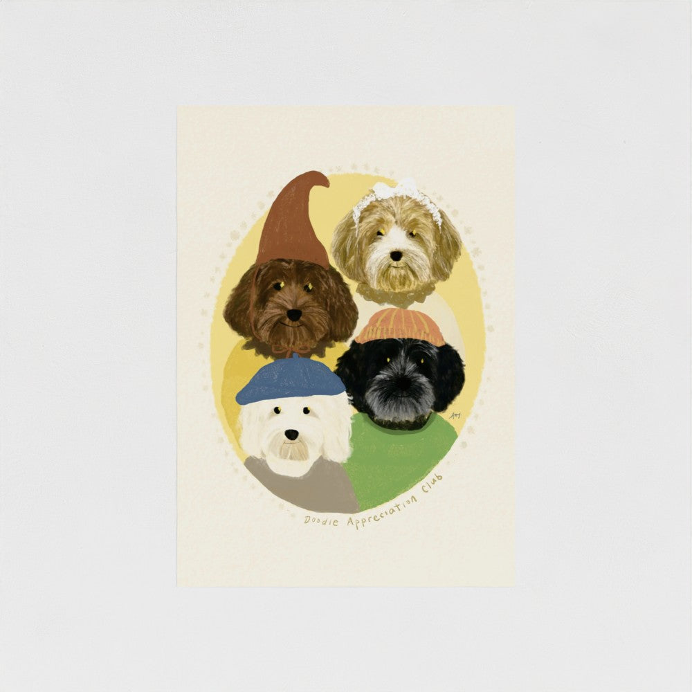 Unframed art print of four doodle dogs wearing colorful hats on a beige background