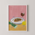 Framed artwork with a pink background, plate of food, glass of wine, tennis ball, and text on a white wall.