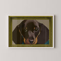 Unframed sausage dog art print displayed in a white frame