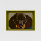 Unframed portrait of a dachshund in an illustrated frame