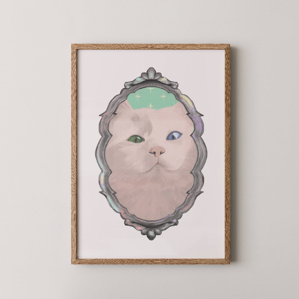 White cat art print displayed in a wooden frame